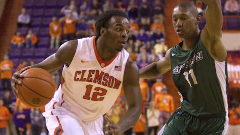 Rod Hall (12) drives to the basket while being defended by Stetson Hatters guard Aaron Graham (11) during the first half at J.C. Littlejohn Coliseum. (Joshua S. Kelly-USA TODAY Sports)